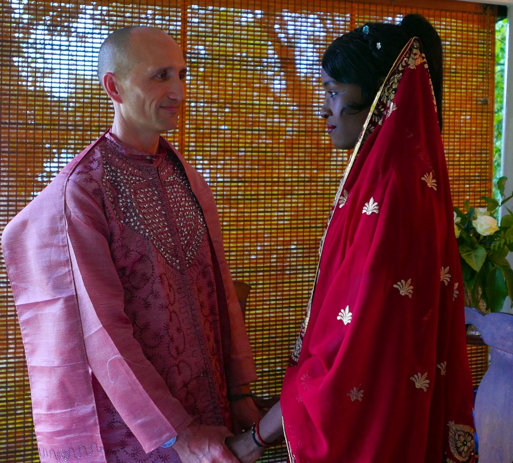 Francis and Rejoice hold hands