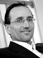 Francis Tapon wears glasses when he has to fool people into thinking that he's smart