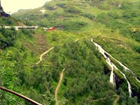 Waterfalls on our way to Flam. We're near Myrdal at this point, but we don't go there. We keep going down. Waterfalls on our way to Flam. We’re near Myrdal at this point, but we don’t go there. We keep going down.